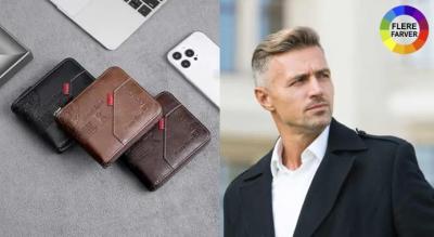 Elegant pung fra CarrKen i blødt og slidstærkt PU-læder med klassisk design.