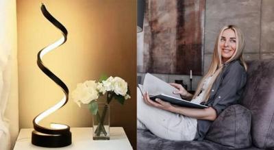 Skab en stemningsfuld og moderne atmosfære i dit hjem med denne nordisk-designede dæmpbare spiral LED-bordlampe.