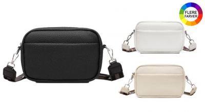 Stilfuld håndtaske, der kan bæres som crossbody eller skuldertaske